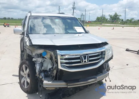 2015 Honda Pilot Touring z USA, uszkodzony, nr VIN 5FNYF3H94FB024267